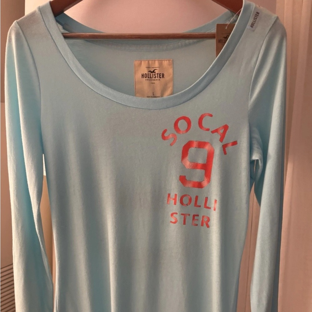 Vintage Hollister Light Blue Long Sleeve Surf Tee with Coral Graphic size Large